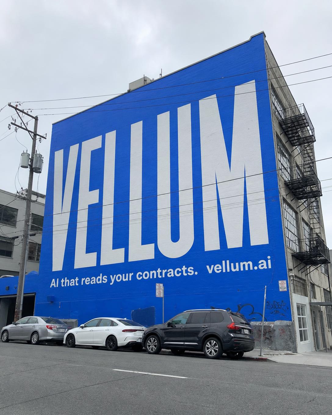 Painted startup wallscape on a SoMa warehouse wall